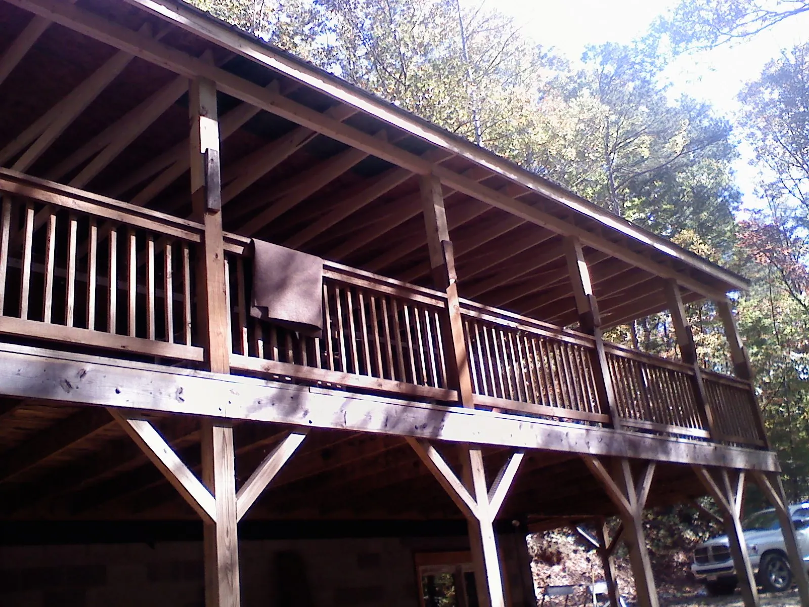 Timber framing under a new elevated porch and deck — Roof Leak Repair in Riverside by Roofing Brothers